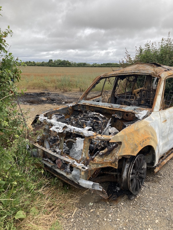 August 8, 2024.  A burnt out Shogun turning the rich colour of the ripening flax beyond.