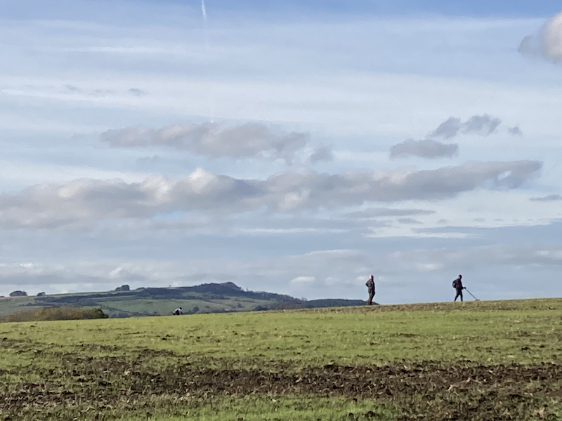 2024 10 27 Detectorists with the iron age hill-fort on Bredon in the background